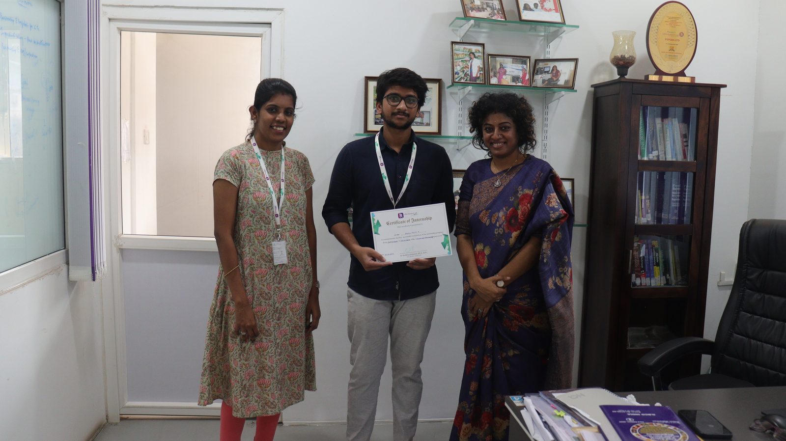 Intern with his Food Research Lab internship certificate alongside CEO Dr Radhika Ganesan and his mentor
