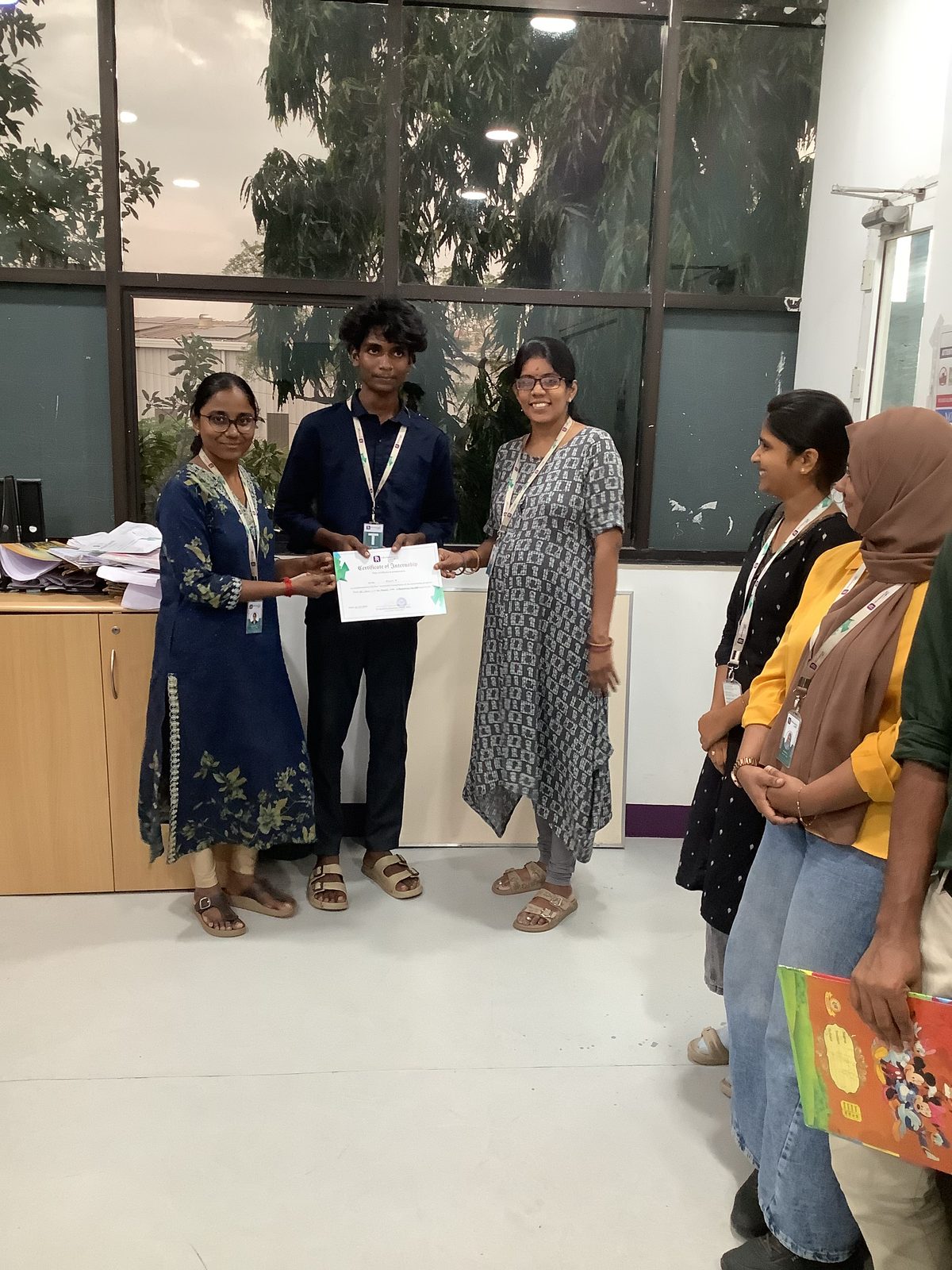 Food Research Lab team congratulating an intern on completing the internship programme